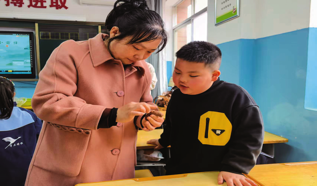 吹響狗娃咪 爭做小雷鋒